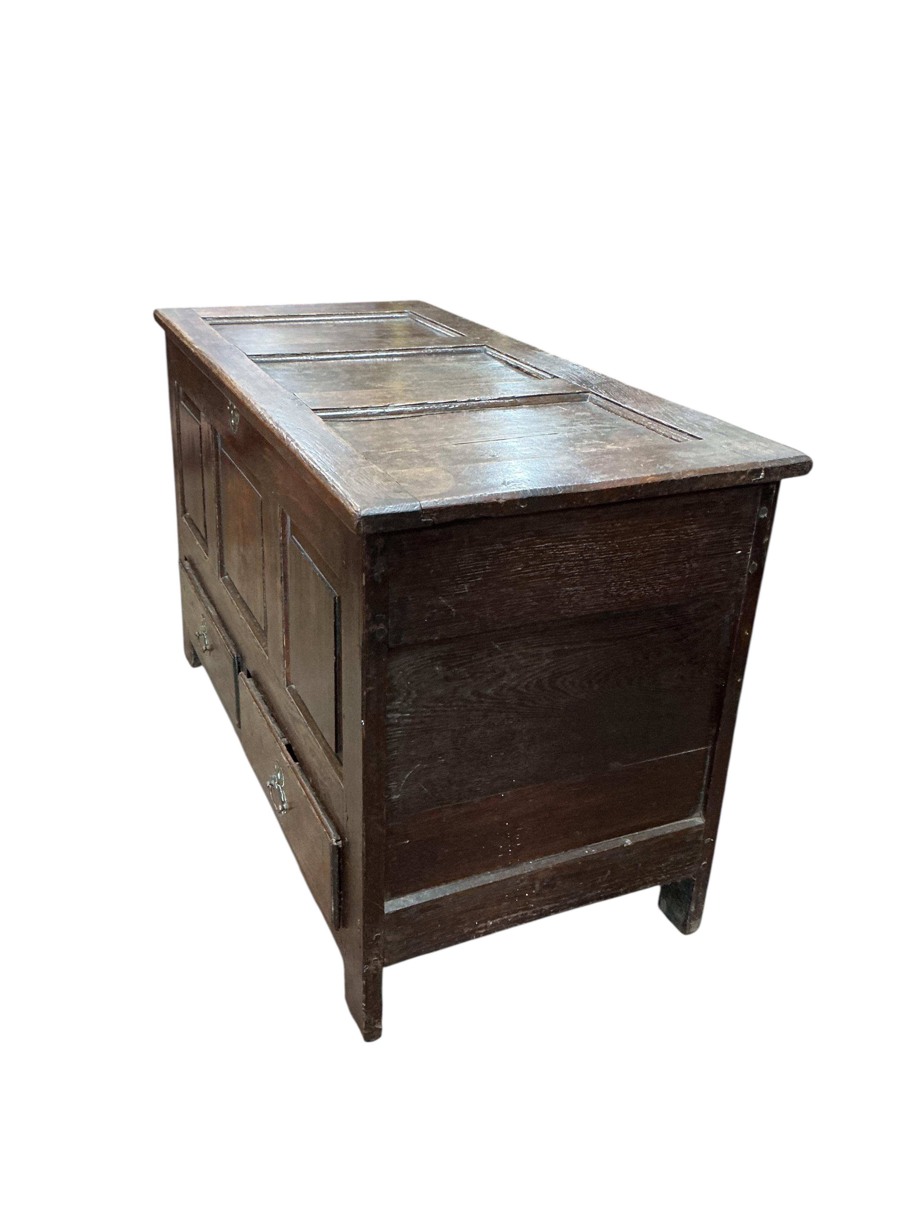 A mid 18th century oak mule chest, width 112cm, depth 51cm, height 67cm